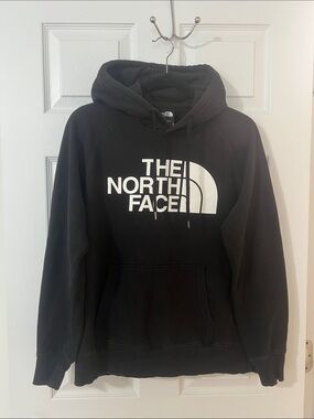 The North Face Black Women's Hoodie with White Logo Tag